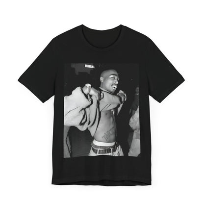 A black graphic t-shirt featuring a vintage hip hop icon graphic of Tupac.
