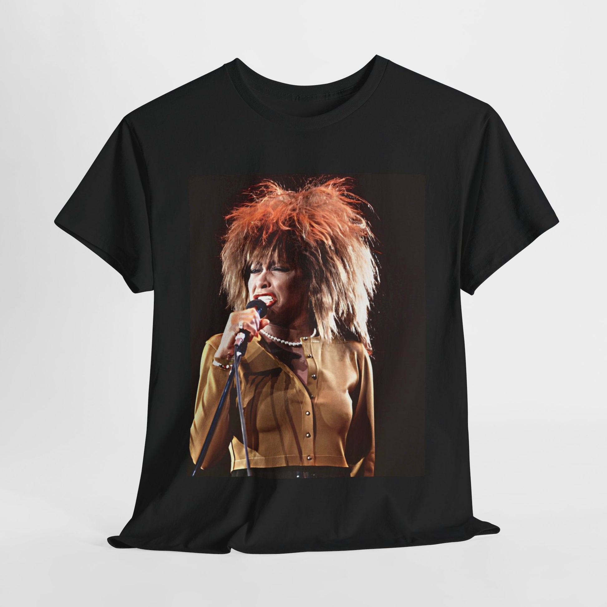A black graphic t-shirt featuring a graphic of Tina Turner as a legendary rock icon.