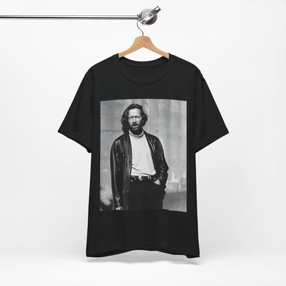 A black graphic t-shirt featuring a retro graphic related to Eric Clapton's 'Cocaine' song or era.