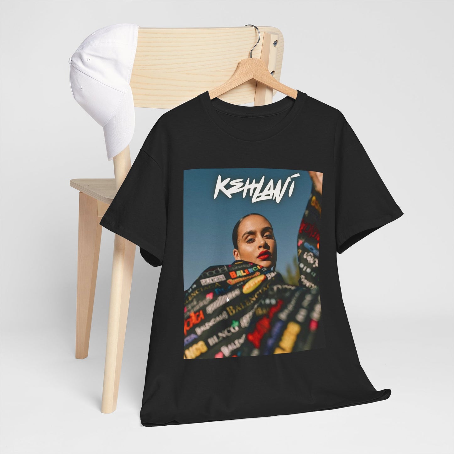 A black graphic t-shirt featuring a retro aesthetic graphic of Kehlani.