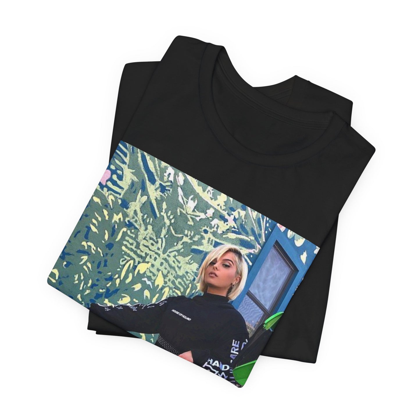 A black graphic t-shirt featuring a vintage pop aesthetic graphic of Bebe Rexha.
