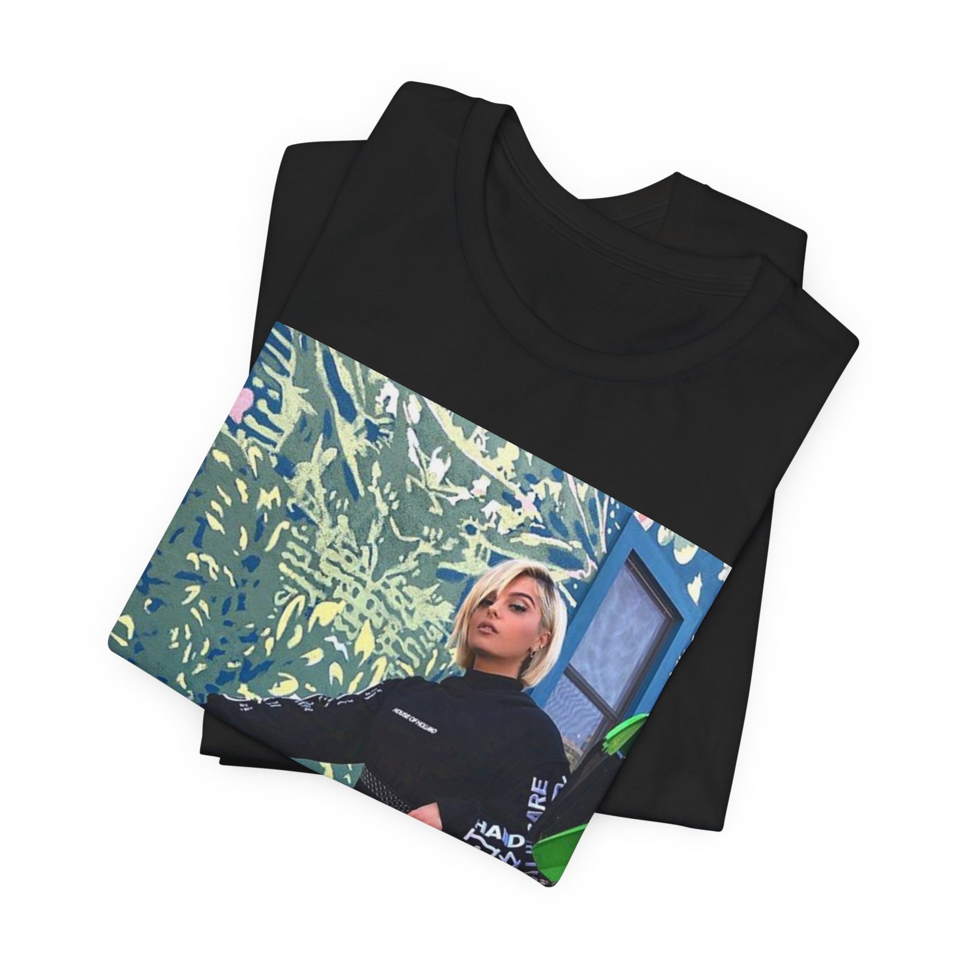 A black graphic t-shirt featuring a vintage pop aesthetic graphic of Bebe Rexha.