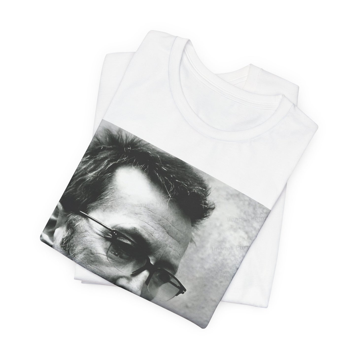 A black graphic t-shirt featuring a black and white, monochrome graphic or photo of Eric Clapton.