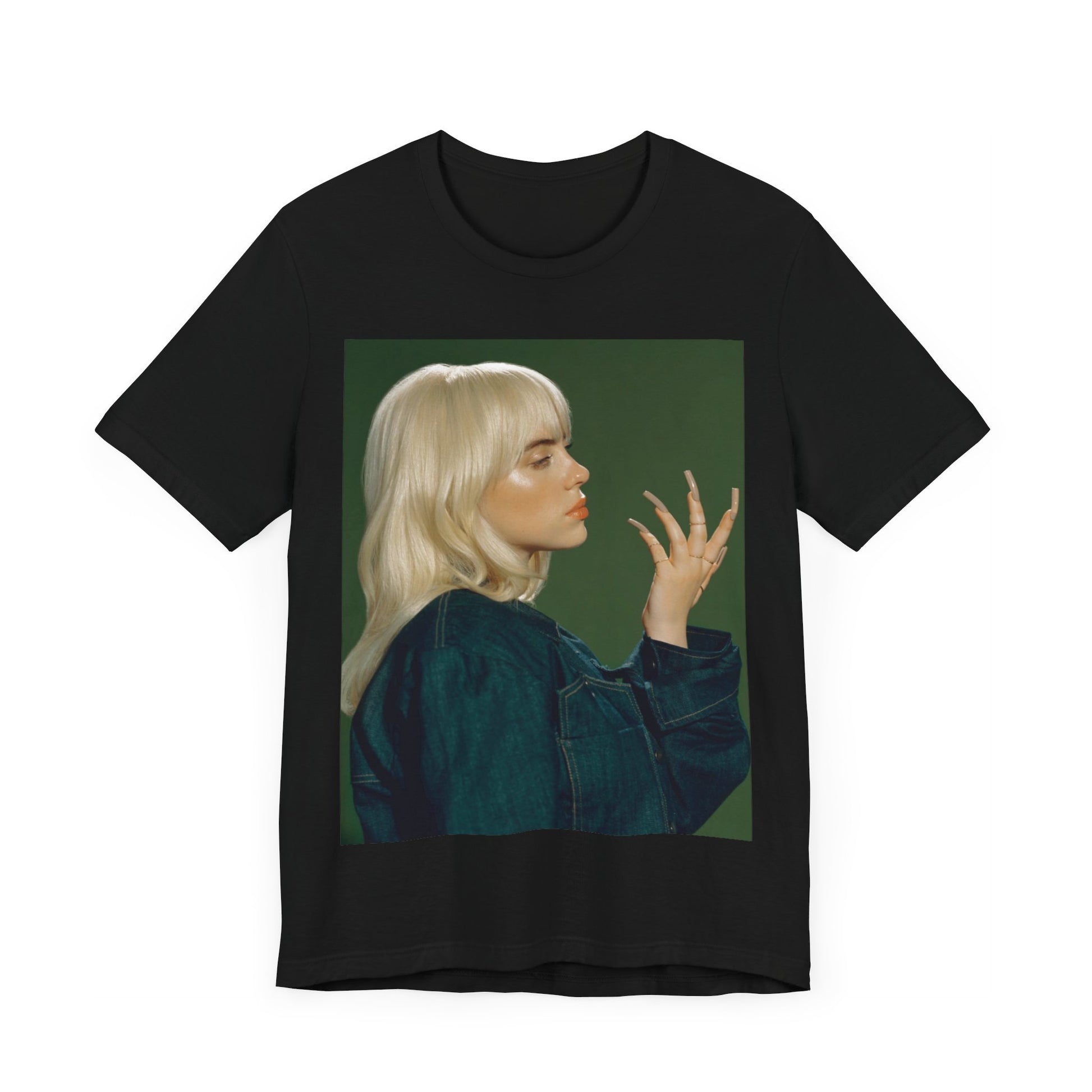 A vintage-style portrait of Billie Eilish with platinum blonde hair and long nails, wearing a denim jacket against a green background.
