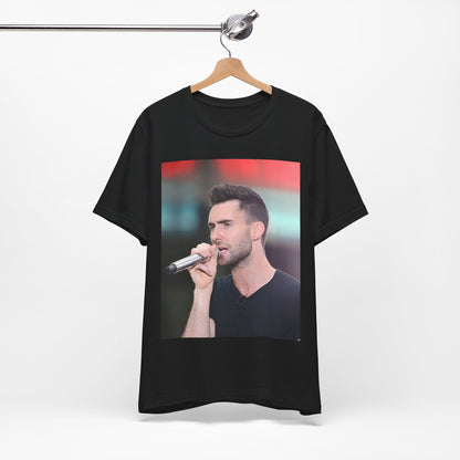 A stylized graphic inspired by the Maroon 5 song "Moves Like Jagger," with funky, retro design elements, on a t-shirt.