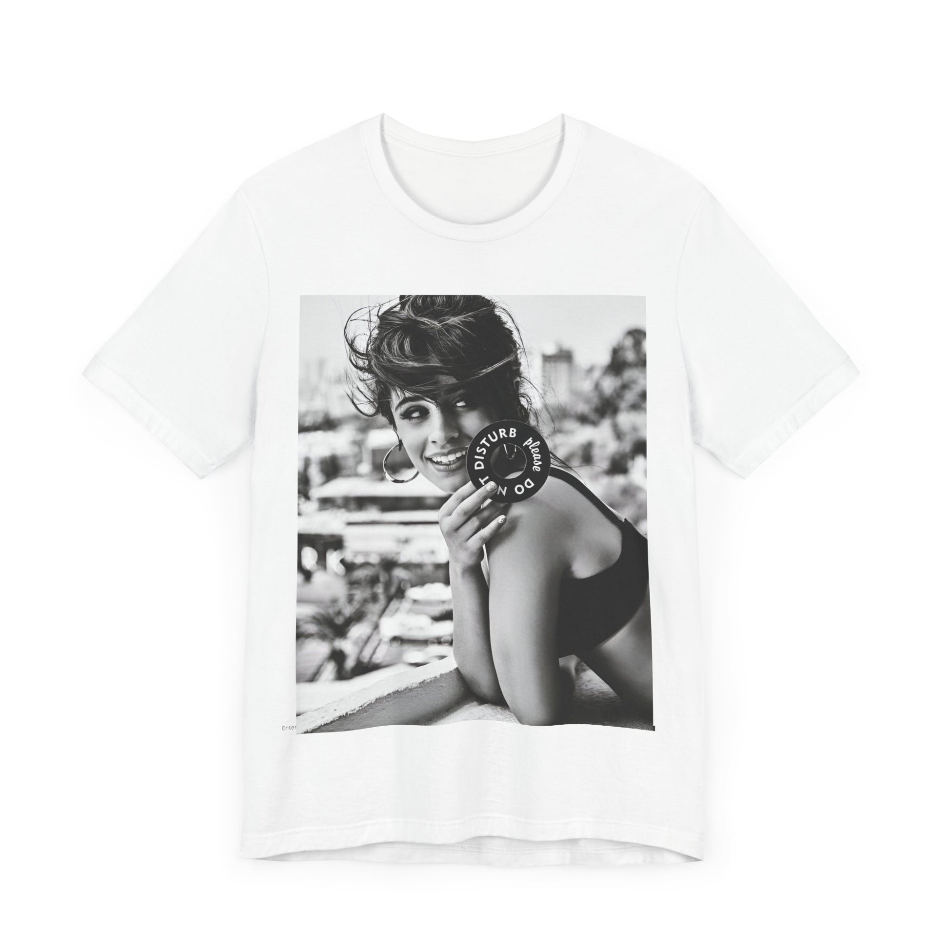 A black graphic t-shirt featuring a black and white photo or graphic of Camila Cabello in an iconic style.
