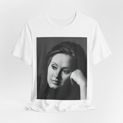 A black graphic t-shirt featuring a vintage-style black and white studio portrait of Adele, showing her with a poised and elegant expression.