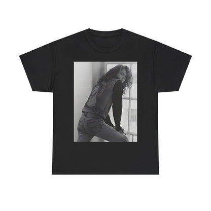 A black graphic t-shirt featuring a 90s black and white photo portrait of Michael Hutchence from INXS.