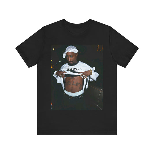 A black graphic t-shirt featuring a graphic of Tupac Shakur (2Pac).