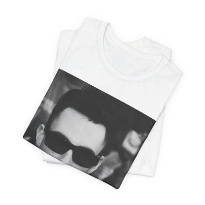 A black and white high-fashion photoshoot photo of Adam Levine, frontman of Maroon 5, looking confidently at the camera.