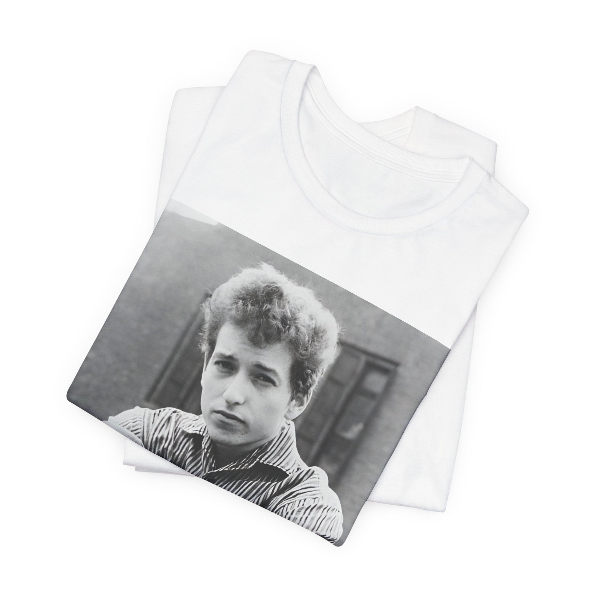 A black graphic t-shirt featuring a graphic of Bob Dylan from his 60s origins in folk music.