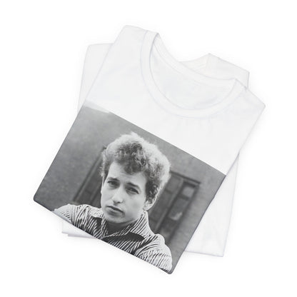 A black graphic t-shirt featuring a graphic of Bob Dylan from his 60s origins in folk music.