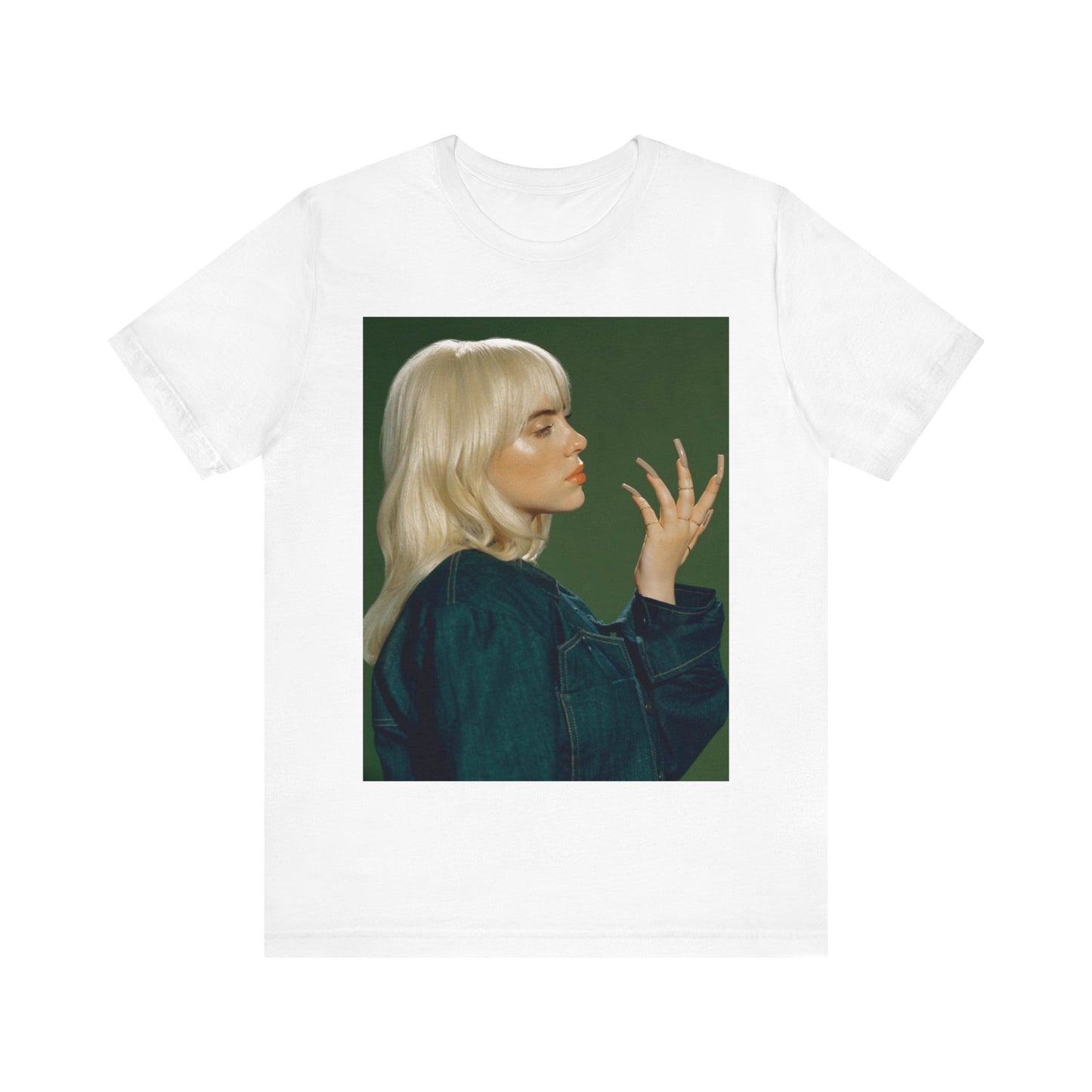 A vintage-style portrait of Billie Eilish with platinum blonde hair and long nails, wearing a denim jacket against a green background.