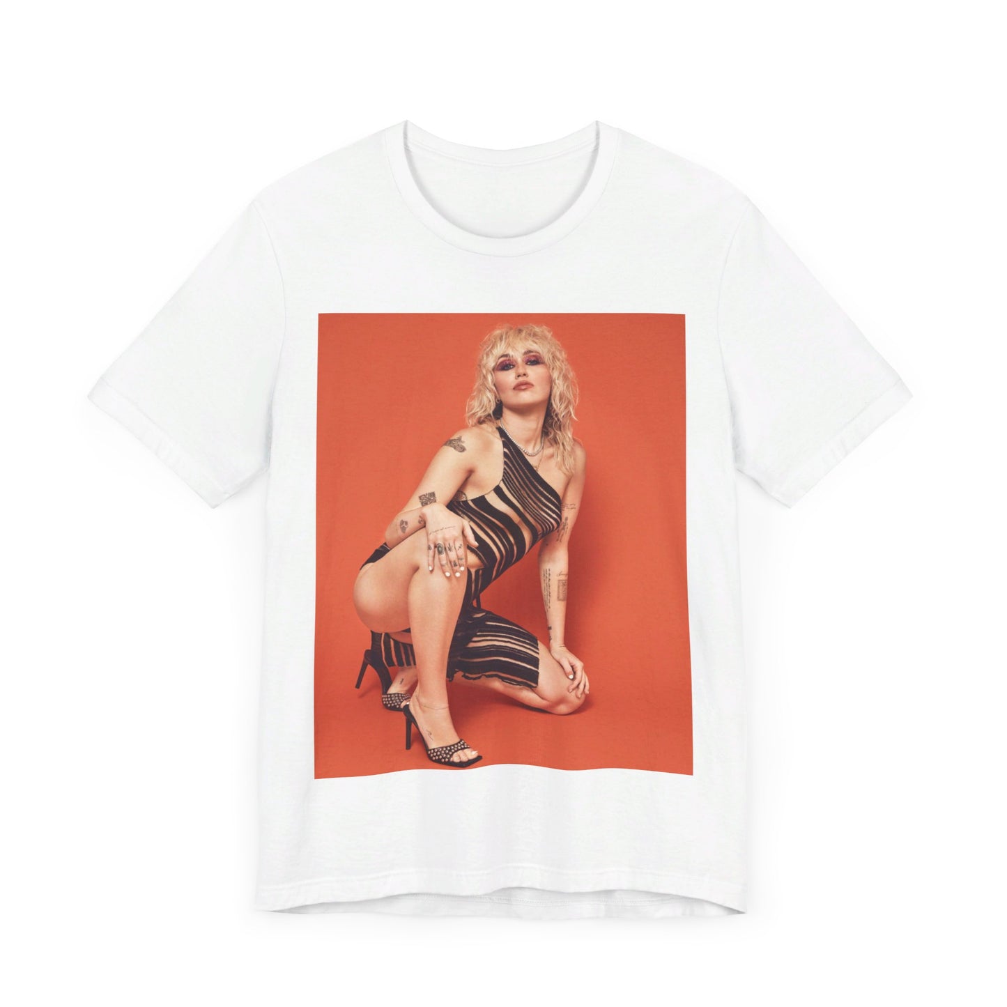 A black graphic t-shirt featuring a casual pop fan graphic of Miley Cyrus.