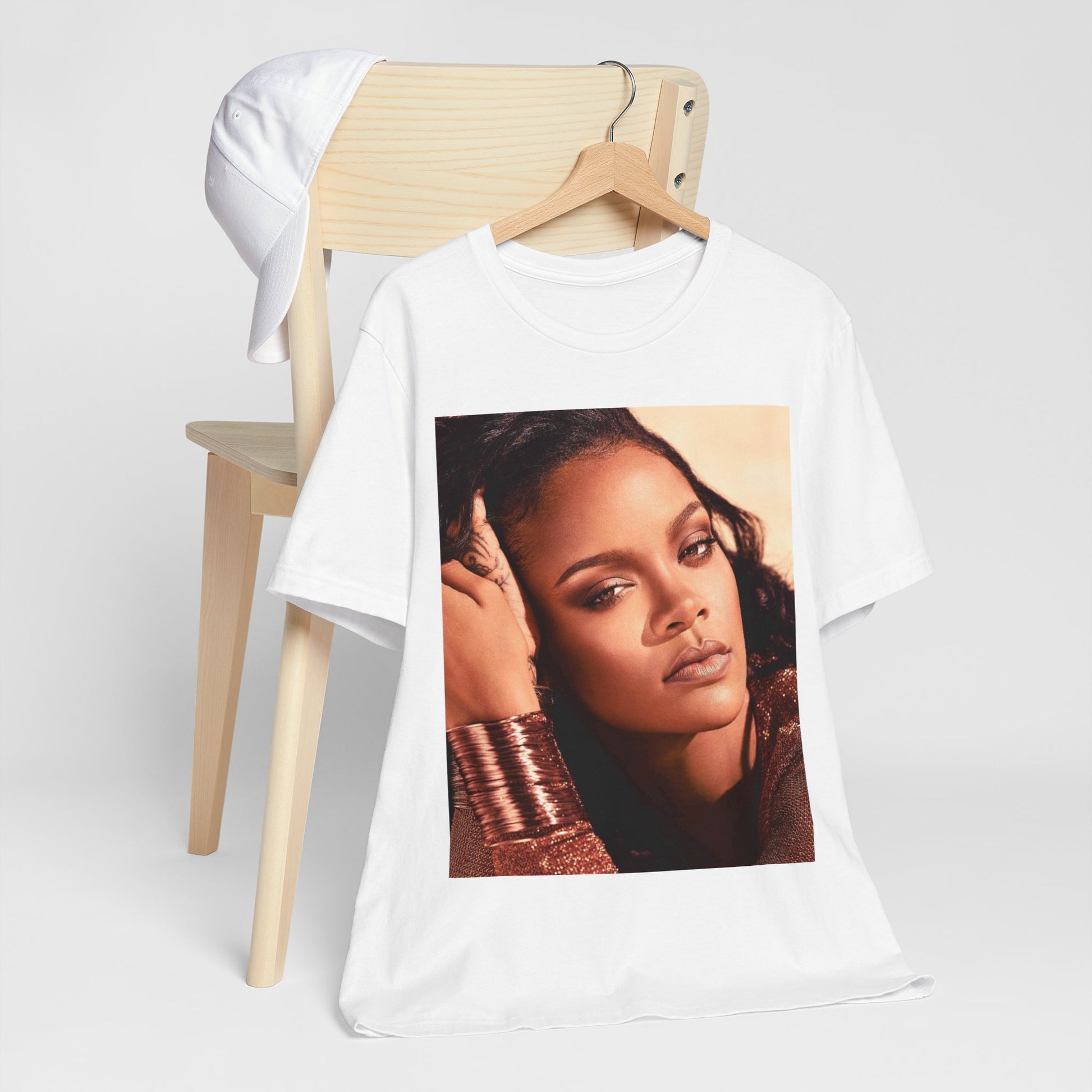 A black graphic t-shirt featuring a retro graphic related to Rihanna's 'Good Girl Gone Bad' album era.