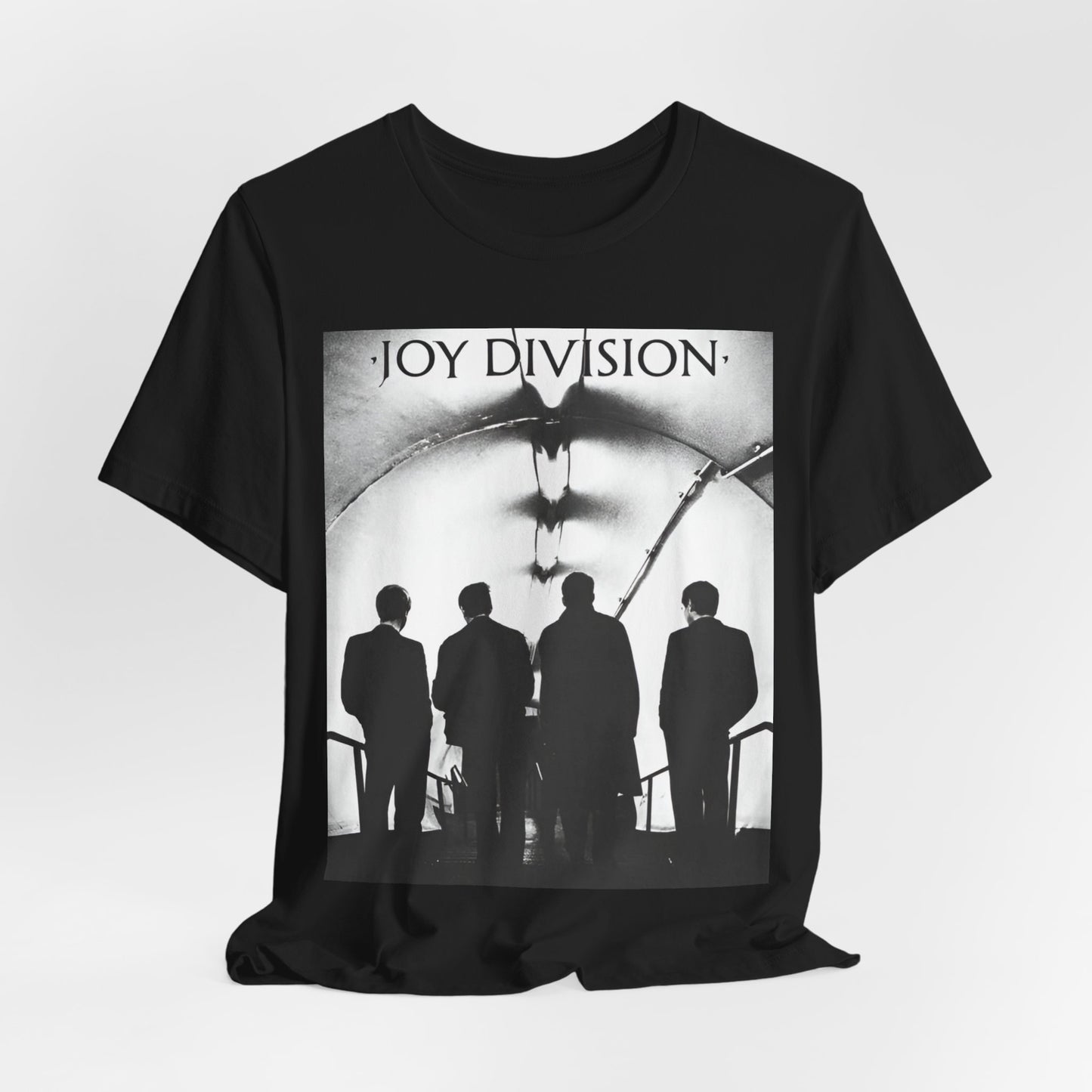 A black graphic t-shirt featuring a vintage post-punk graphic of Joy Division.