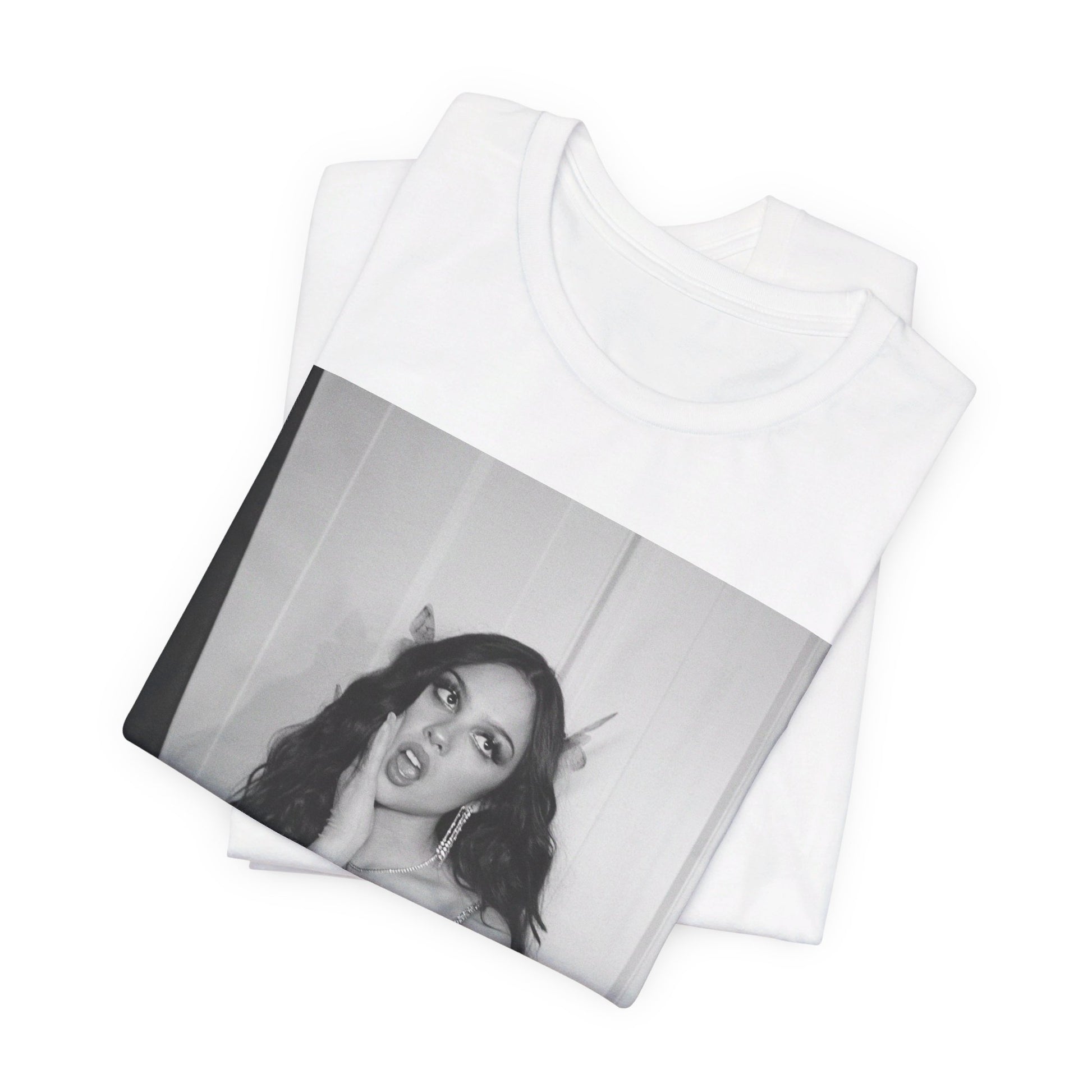 A black graphic t-shirt featuring a black and white, monochrome graphic or photo of Olivia Rodrigo.