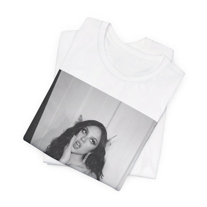 A black graphic t-shirt featuring a black and white, monochrome graphic or photo of Olivia Rodrigo.