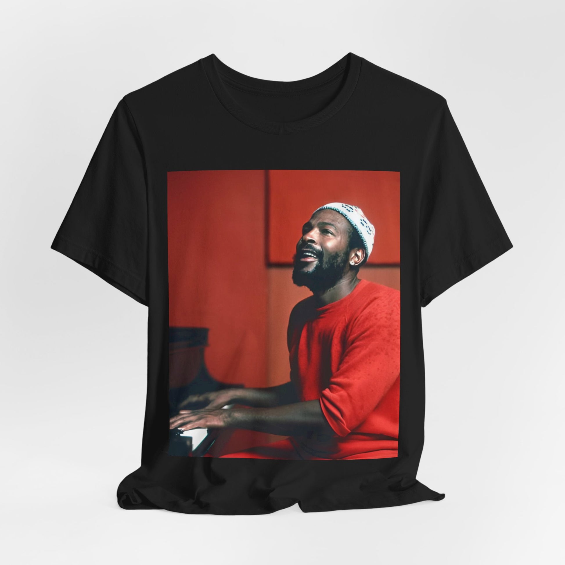 A black graphic t-shirt featuring a graphic of Marvin Gaye with a piano.
