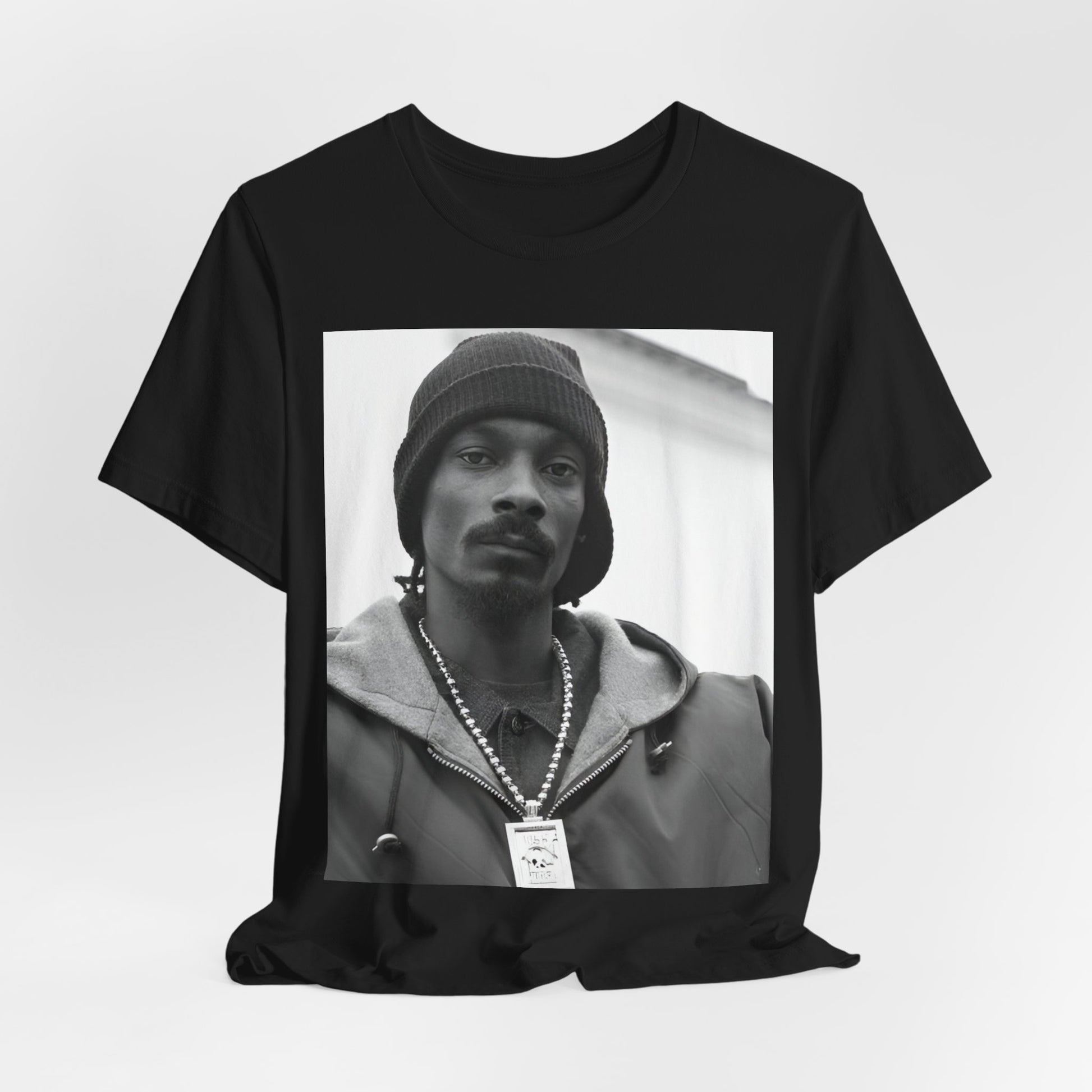 A black graphic t-shirt featuring a black and white, monochrome graphic of Snoop Dogg with an OG cool vibe.