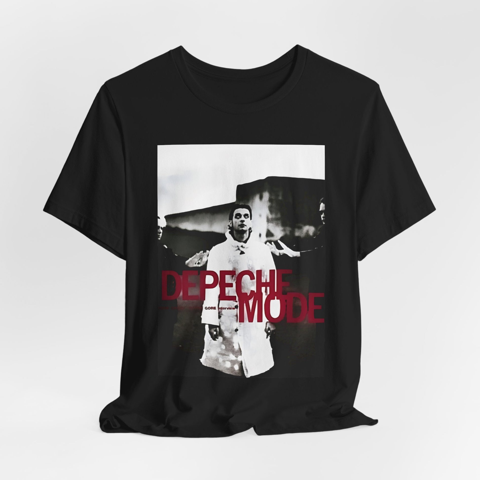 A black graphic t-shirt featuring a graphic related to Depeche Mode's 'Policy of Truth' song or era.