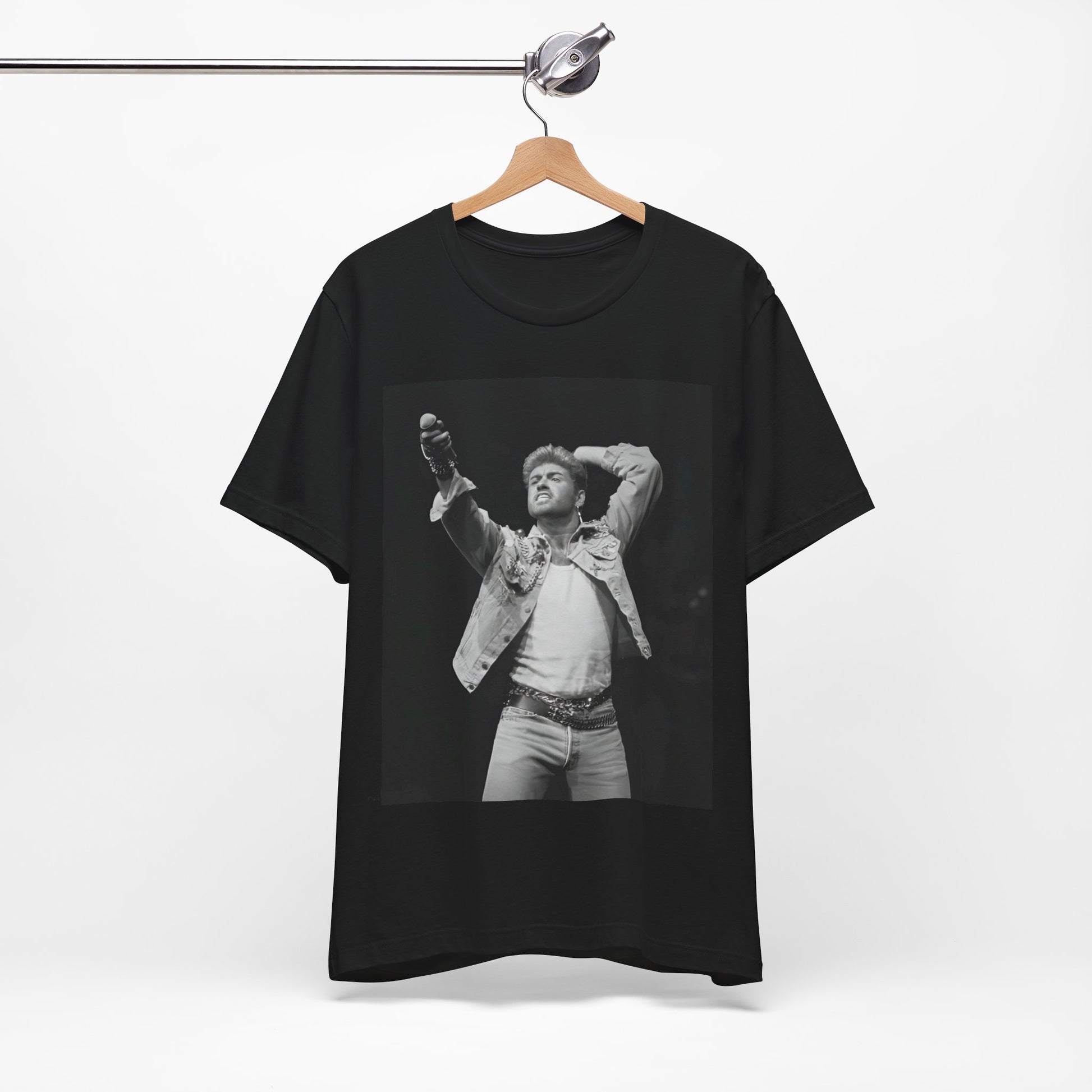A black graphic t-shirt featuring a graphic or photo of George Michael performing live on stage.