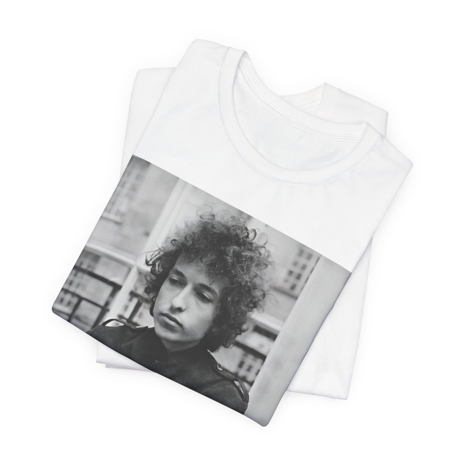 A black graphic t-shirt featuring a black and white graphic of Bob Dylan from the folk revival era.