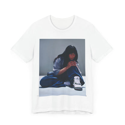 An artistic and slightly melancholic graphic t-shirt inspired by Billie Eilish's song "Lovely," featuring soft colors and a dreamy style.