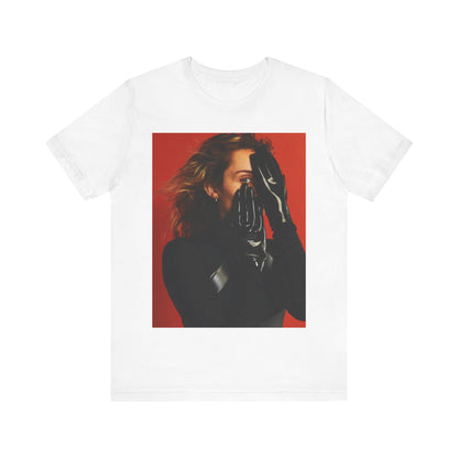 A black graphic t-shirt featuring a graphic of Miley Cyrus with Nashville or country music elements.