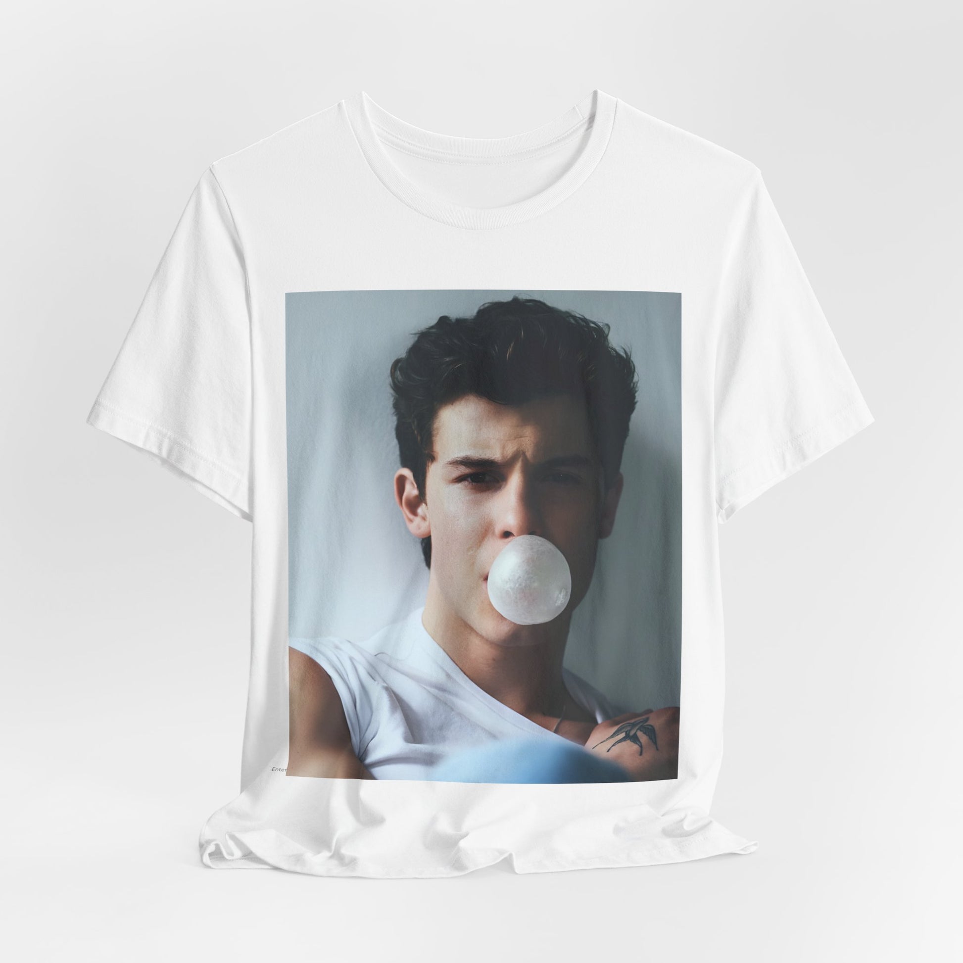 A black graphic t-shirt featuring a photo of Shawn Mendes with a fierce, confident gaze.