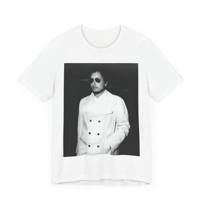 A black graphic t-shirt featuring a vintage black and white photo of Bob Dylan in a contemplative or iconic pose.