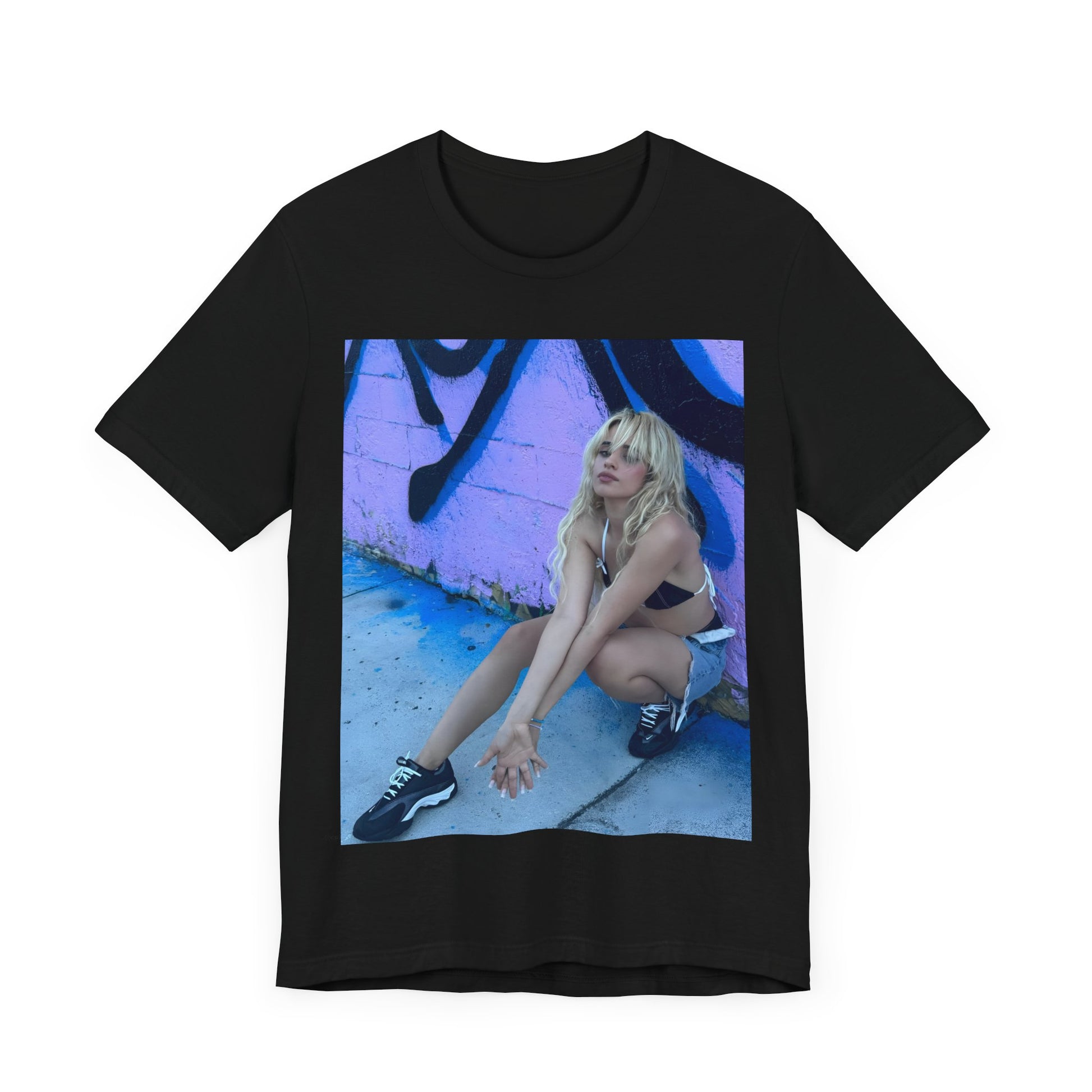 A black graphic t-shirt featuring a photo of Camila Cabello from her "Romance" album era.