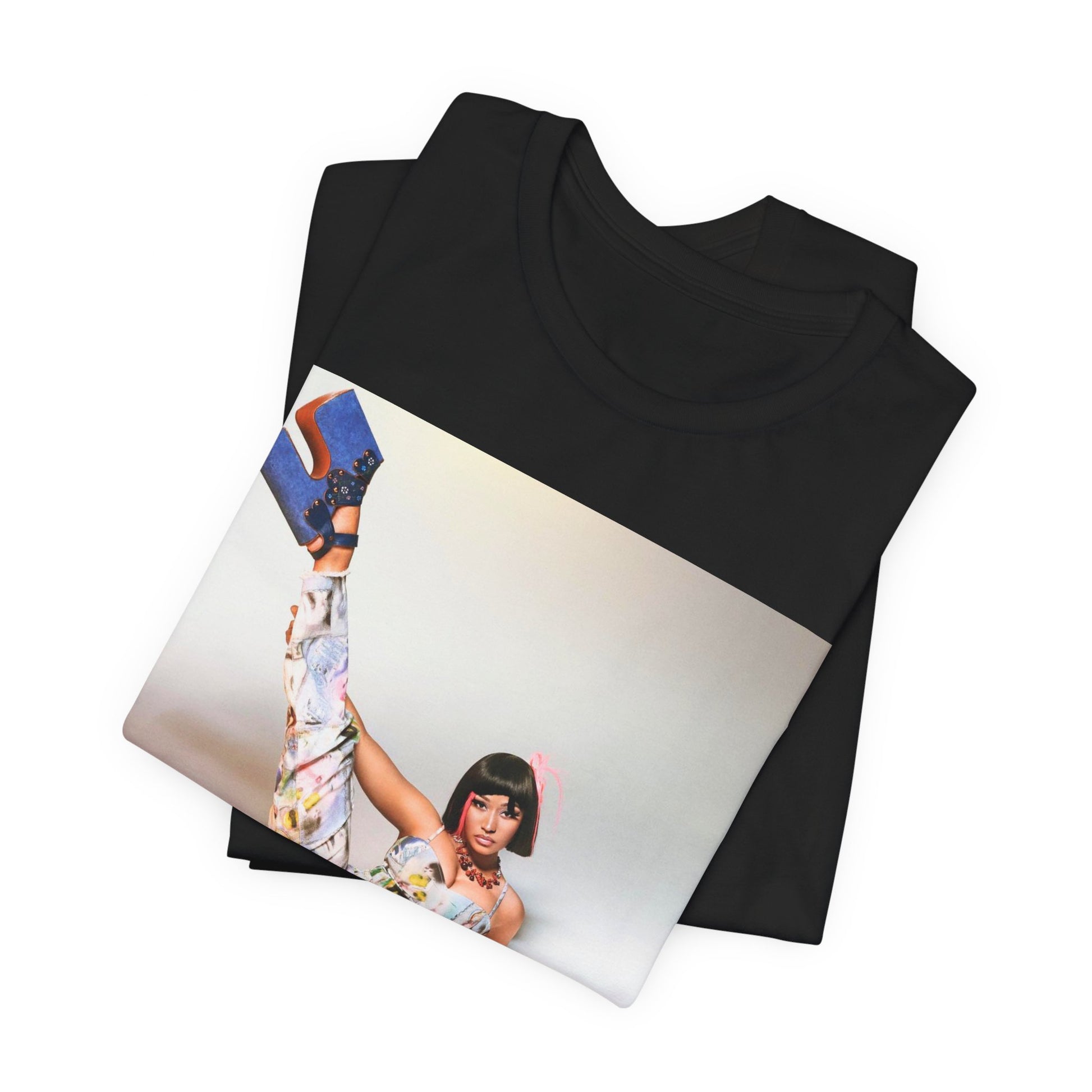 A black graphic t-shirt featuring a graphic of Nicki Minaj as a global fashion rap queen.