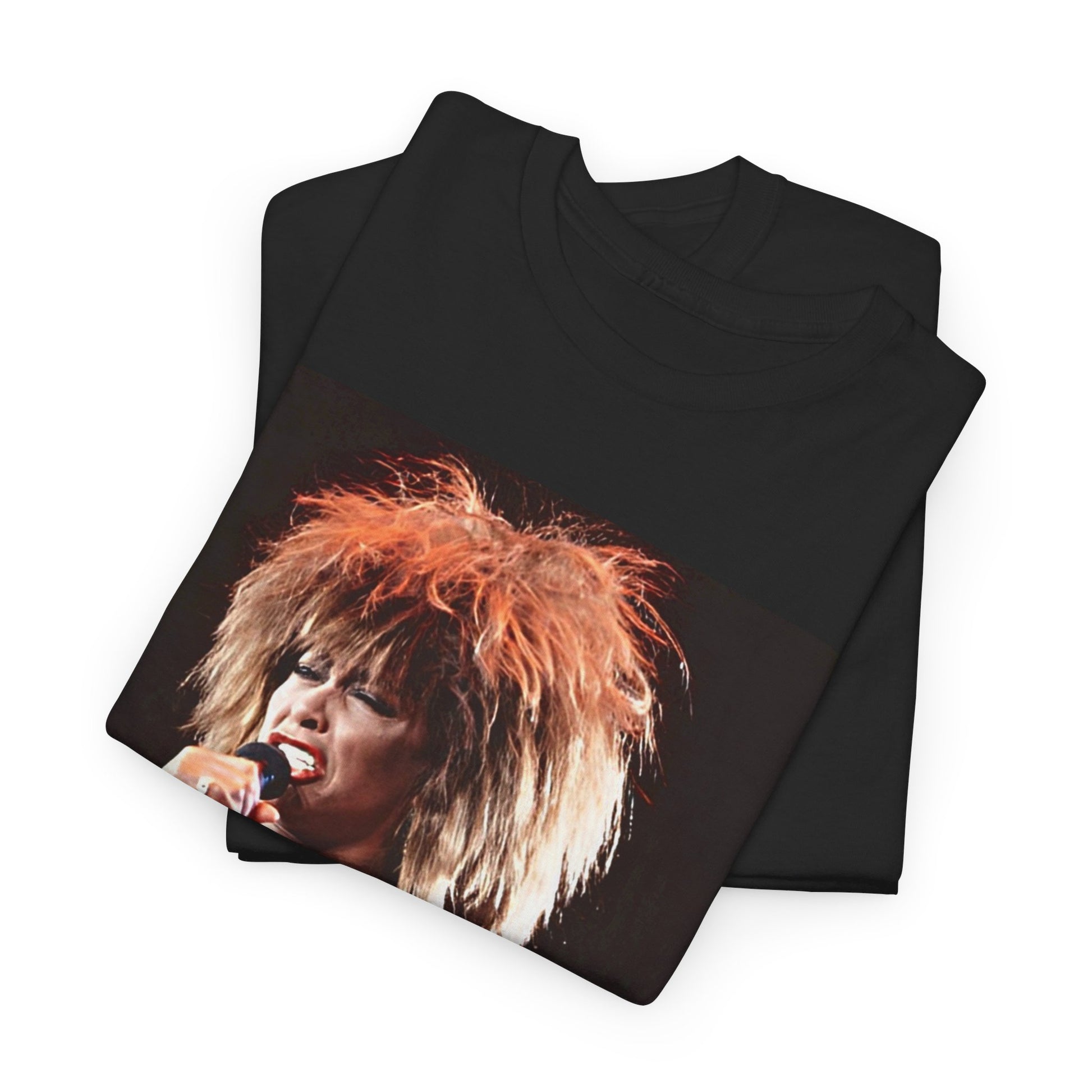 A black graphic t-shirt featuring a graphic of Tina Turner as a legendary rock icon.