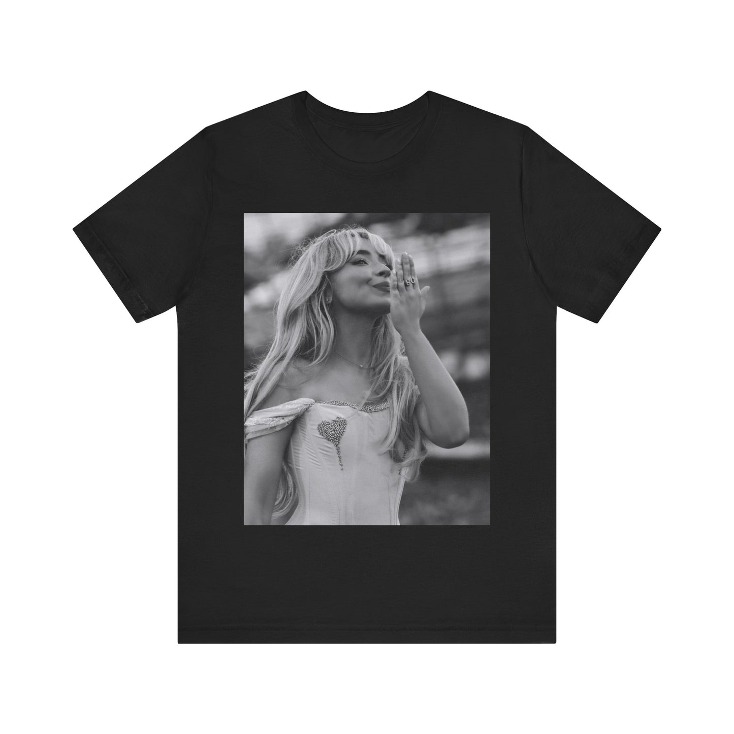 A black graphic t-shirt featuring a graphic or photo of Sabrina Carpenter kissing on stage during a performance.