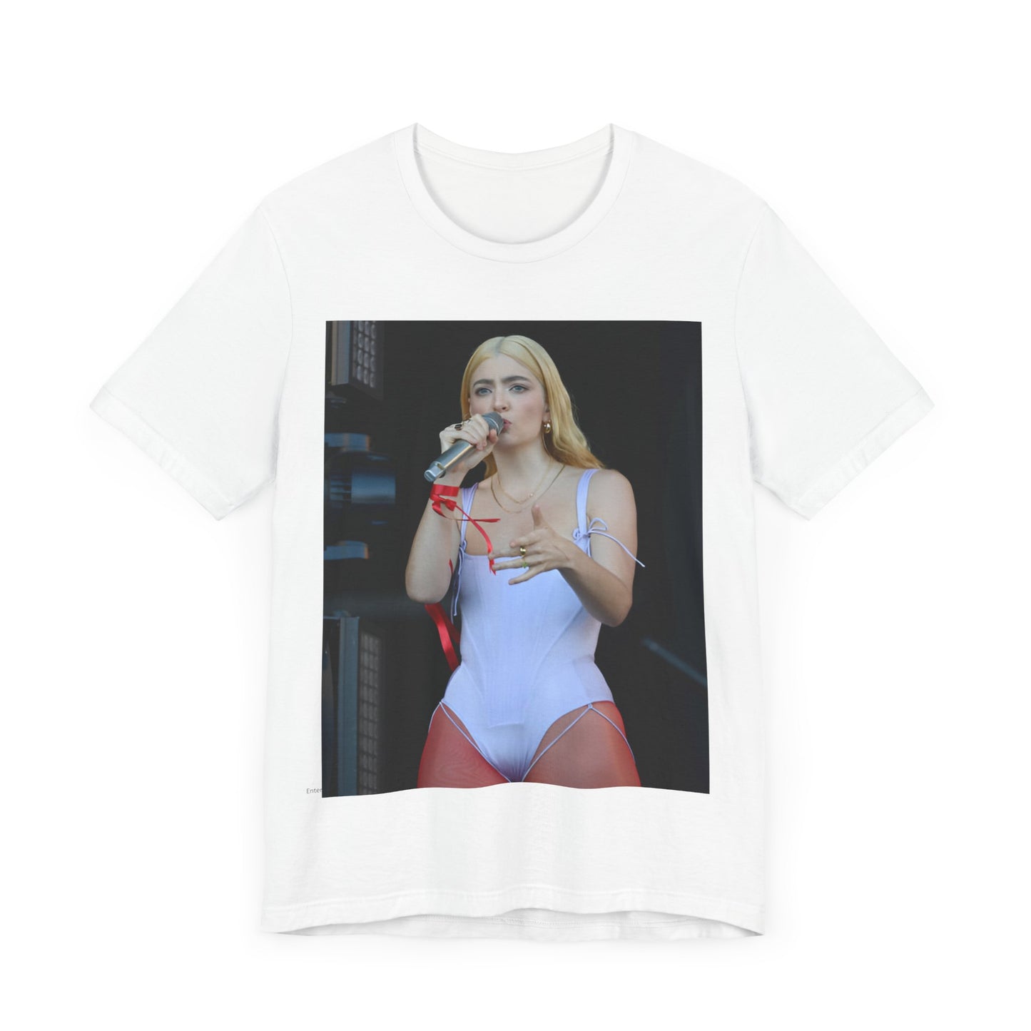 A black graphic t-shirt featuring a graphic or photo of Lorde performing on stage in a cool alternative music style.