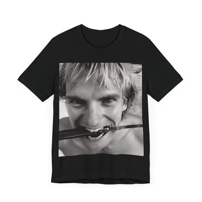 A black graphic t-shirt featuring a wild photo graphic of Sting.