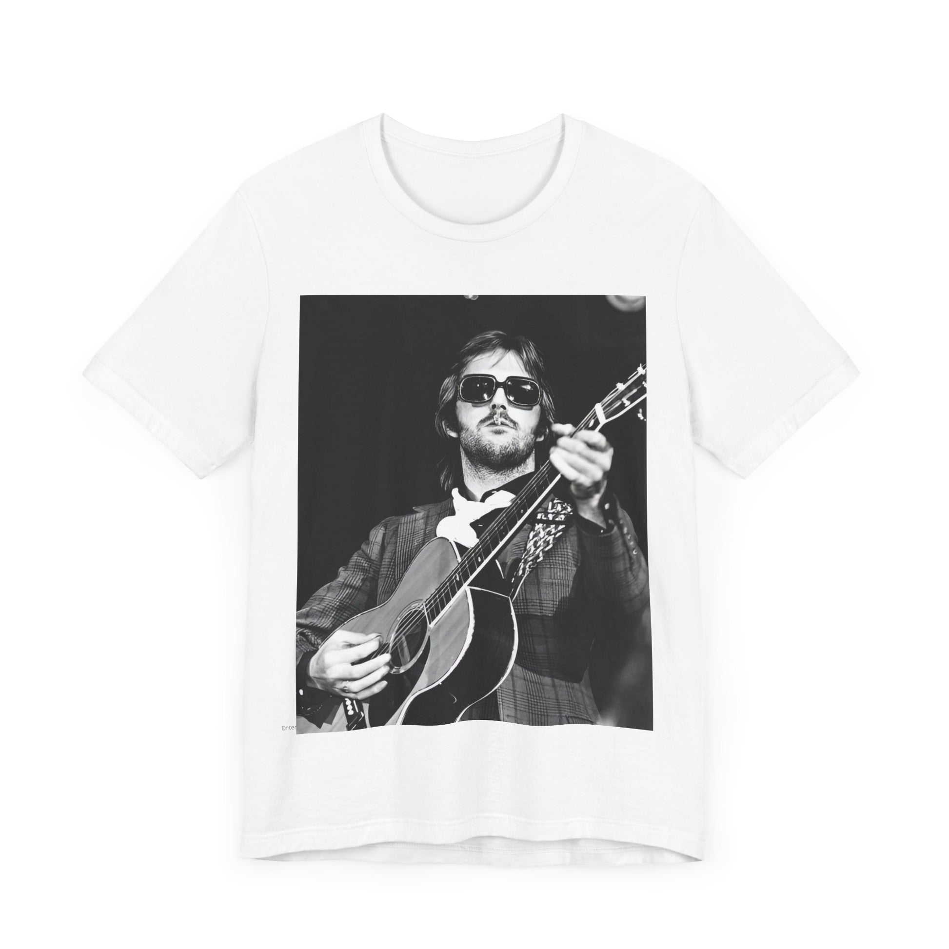 A black graphic t-shirt featuring a graphic of Eric Clapton with a chill blues rock vibe.