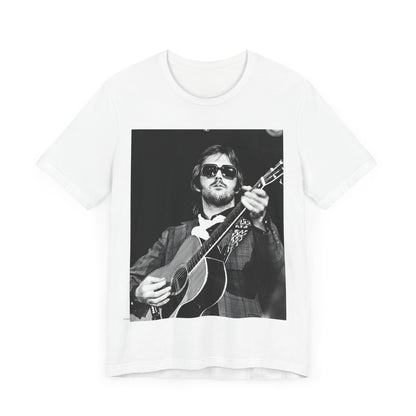 A black graphic t-shirt featuring a graphic of Eric Clapton with a chill blues rock vibe.