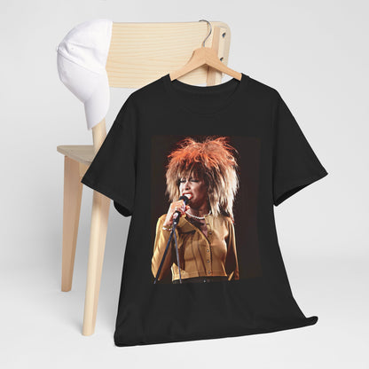 A black graphic t-shirt featuring a graphic of Tina Turner as a legendary rock icon.