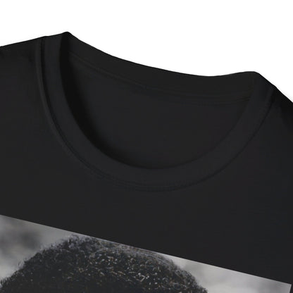 A black graphic t-shirt featuring a 70s-style graphic of Barry White with an iconic, joyful smile.
