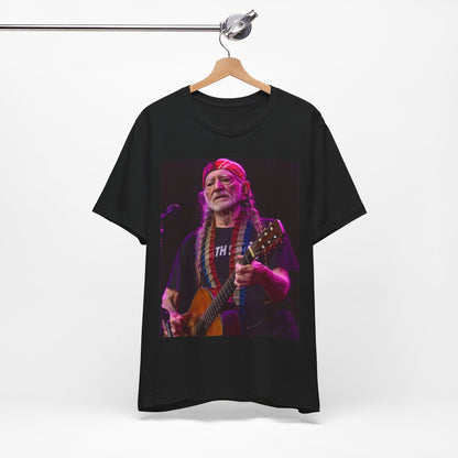 A black graphic t-shirt featuring an outlaw country legend graphic of Willie Nelson.