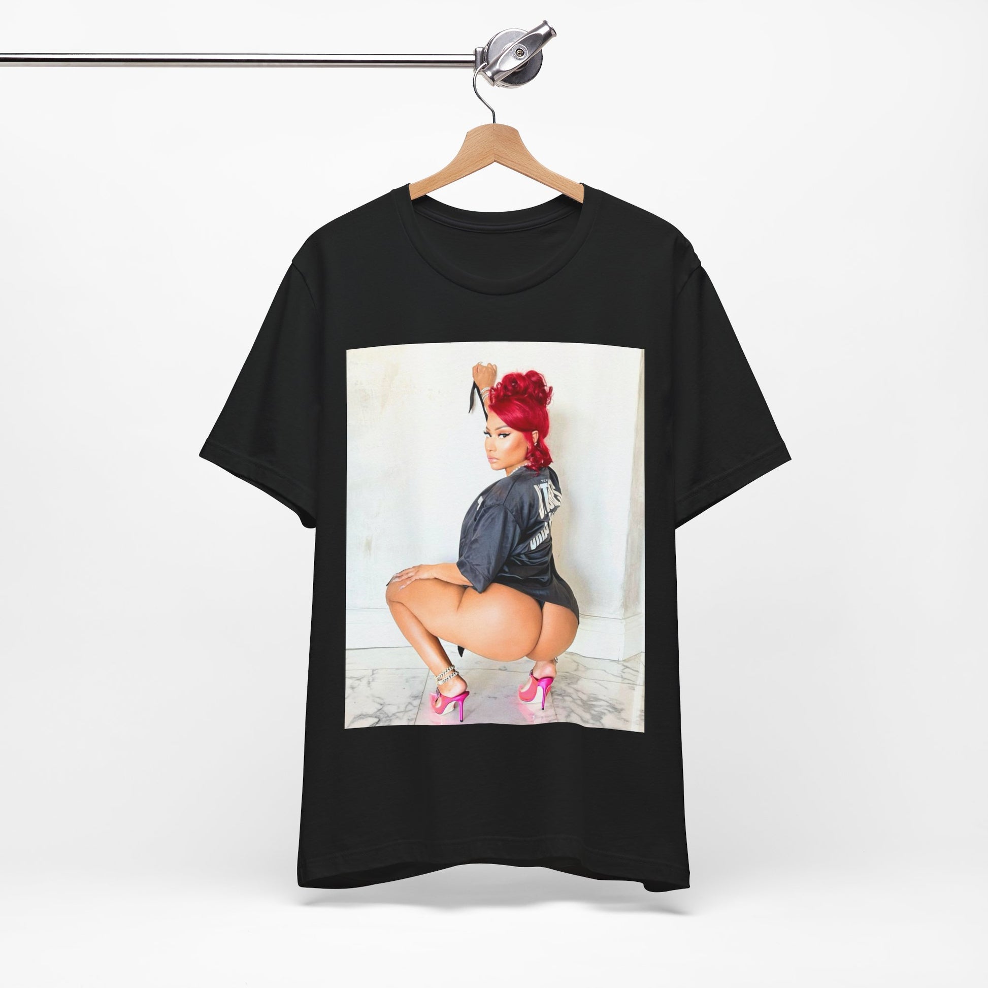 A black graphic t-shirt featuring a graphic of Nicki Minaj in an iconic power pose.