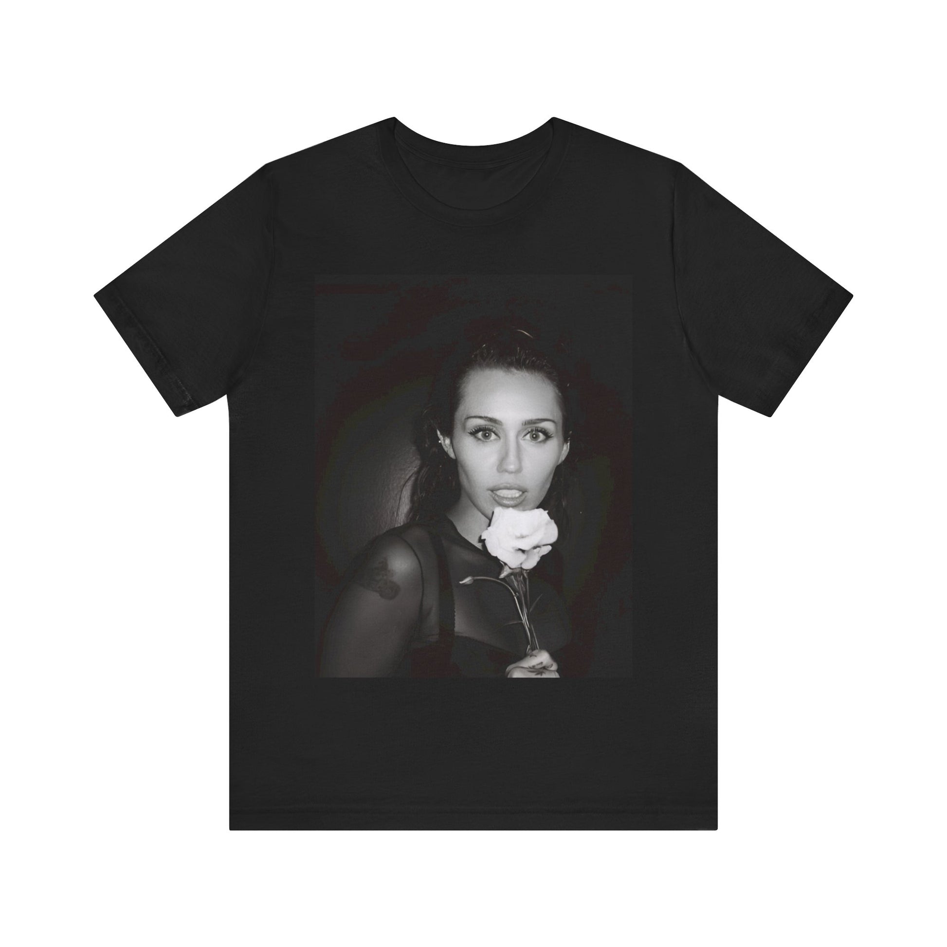 A black graphic t-shirt featuring a graphic related to Miley Cyrus' 'Flowers' song or era.