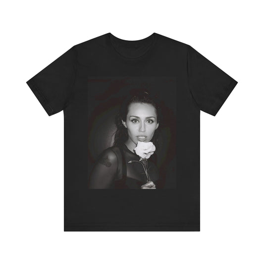 A black graphic t-shirt featuring a graphic related to Miley Cyrus' 'Flowers' song or era.