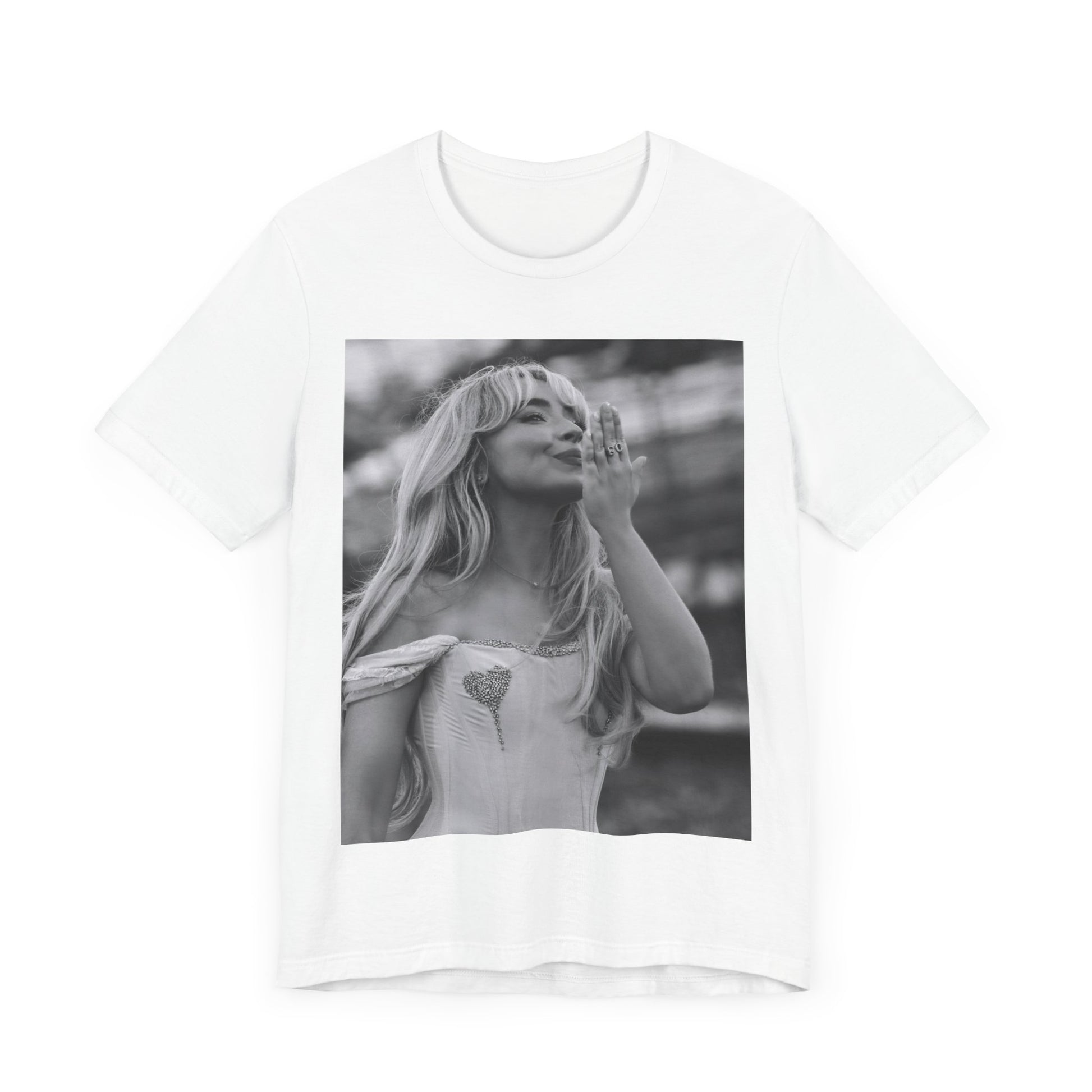 A black graphic t-shirt featuring a graphic or photo of Sabrina Carpenter kissing on stage during a performance.