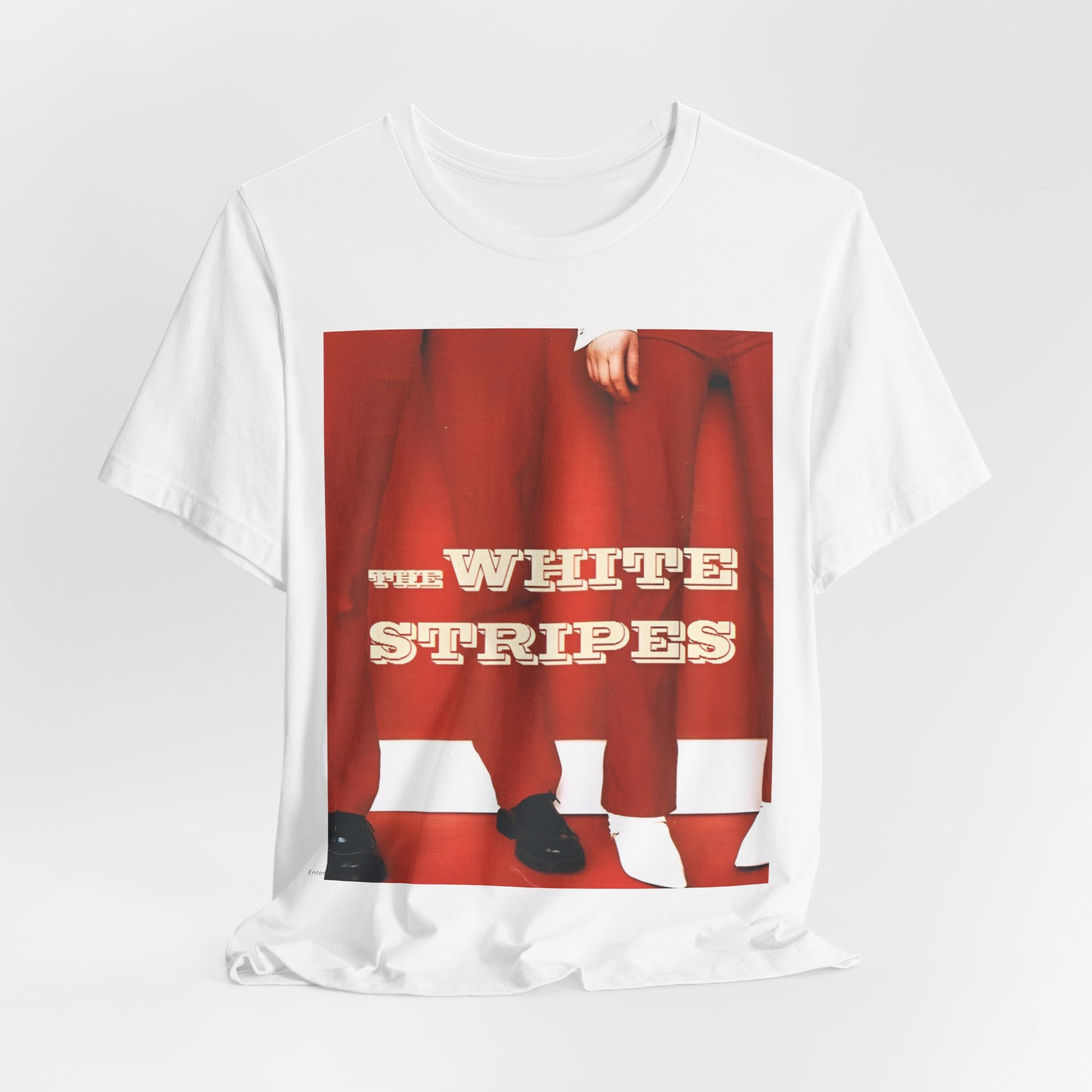 A black graphic t-shirt featuring a red and white signature graphic of The White Stripes.