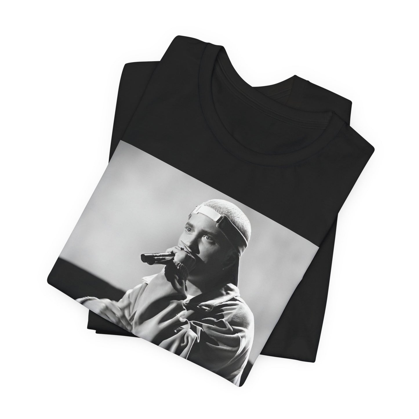A black graphic t-shirt featuring a black and white graphic of Eminem as a 'Rap Messiah'.