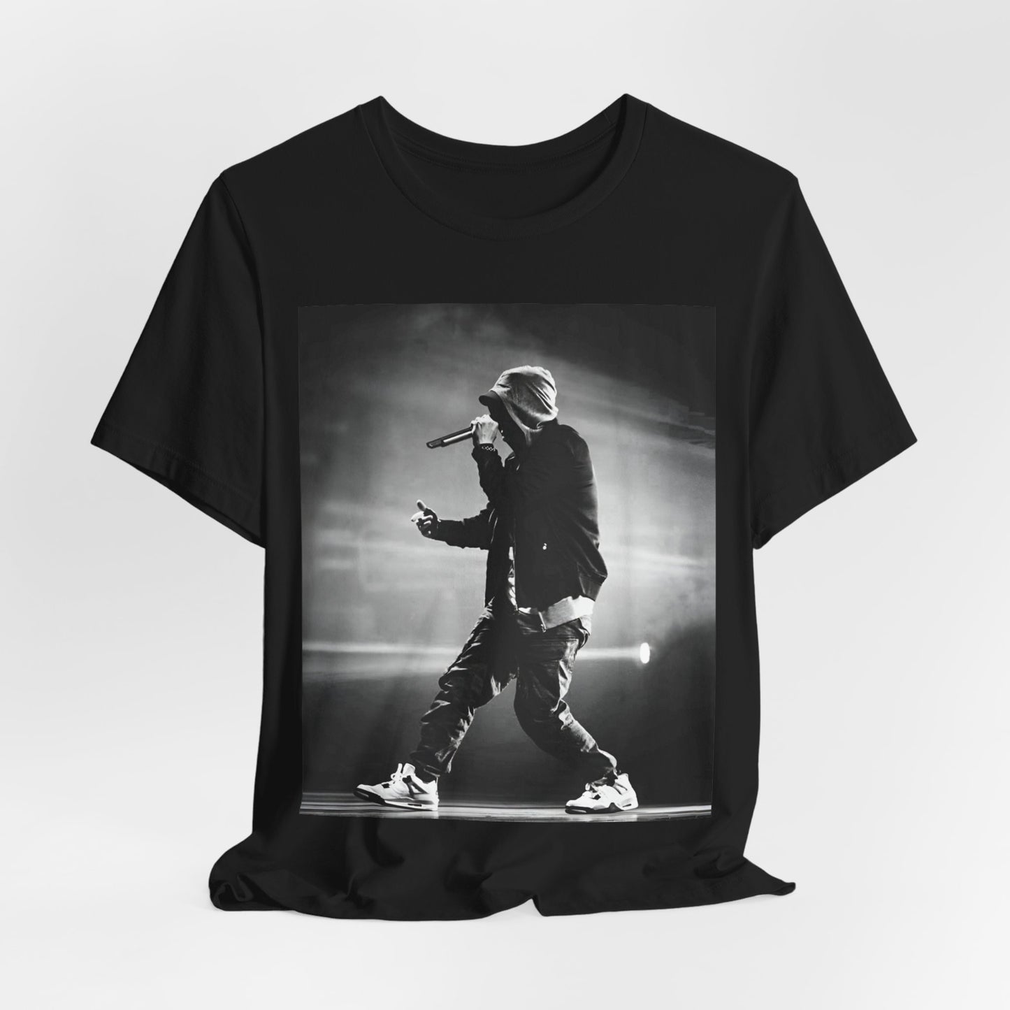 A black graphic t-shirt featuring a boxy hip hop aesthetic graphic of Eminem.