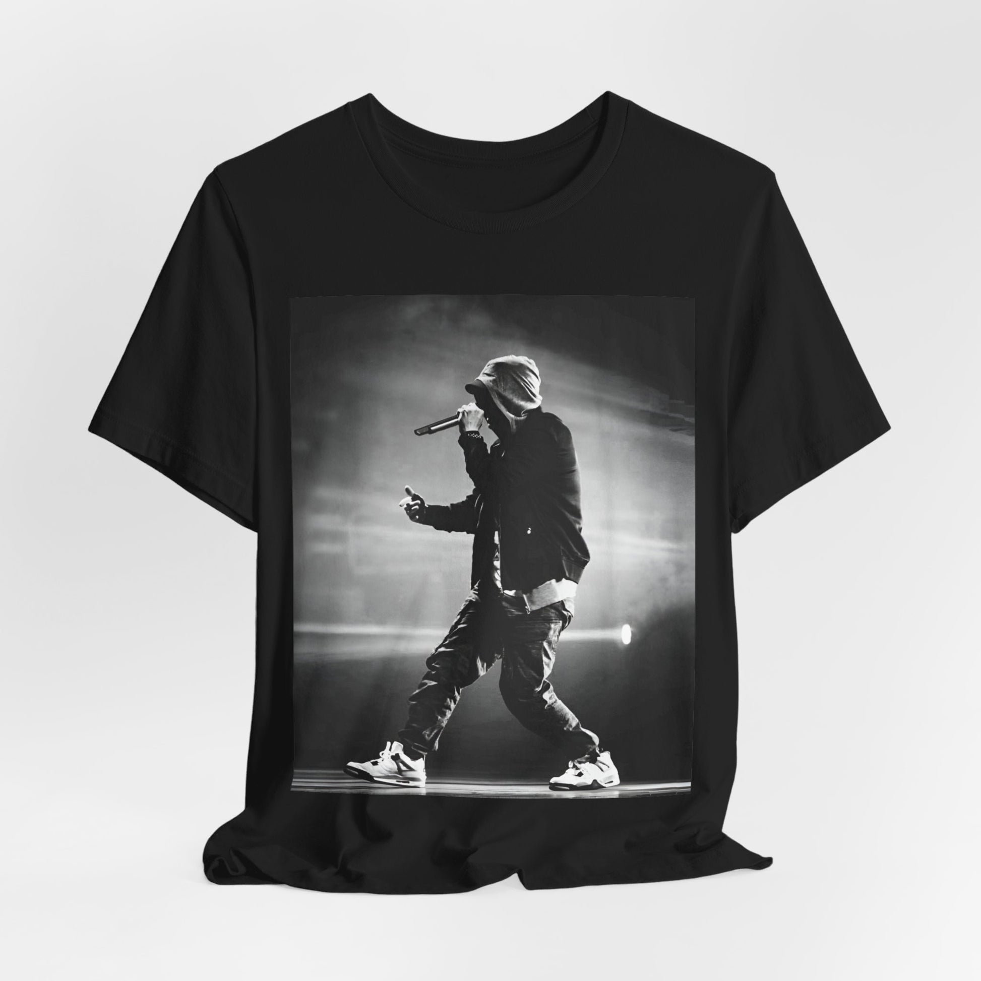 A black graphic t-shirt featuring a boxy hip hop aesthetic graphic of Eminem.
